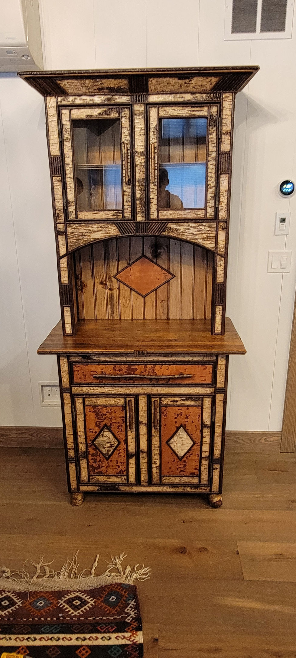 Adirondack bark and stick cupboard