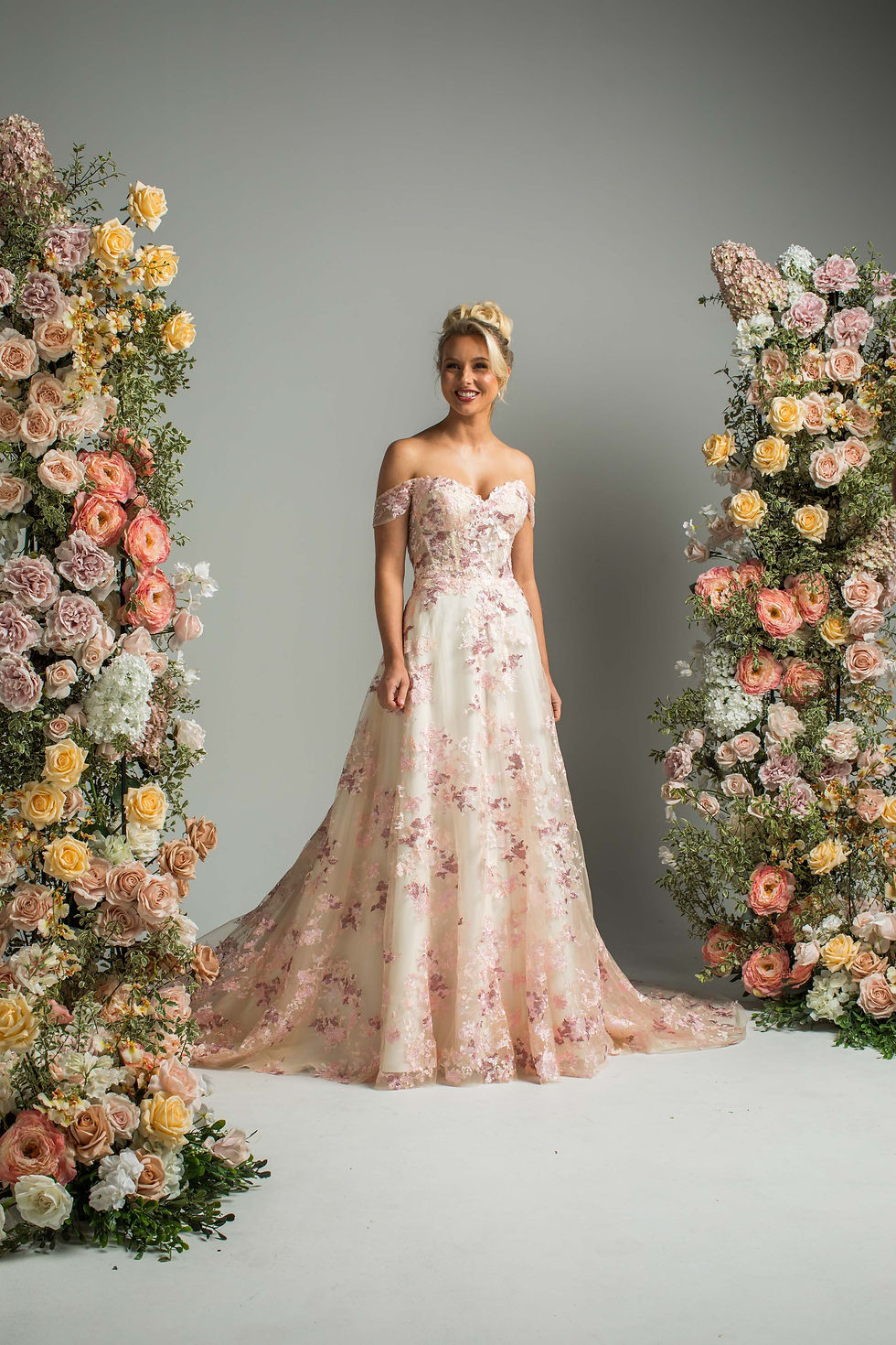True Colours PF429 pink lace A-line gown with sweetheart neckline, detachable straps, bow back and pockets. Front View