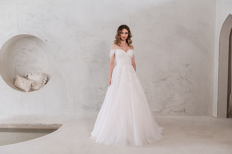 Front view of ‘If By Chance’ by Purple Fox with lace bodice, spaghetti straps, and glitter tulle skirt