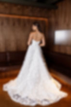 Tina by Jack Sullivan mikado A-line gown with organza overlay, petal skirt detailing and rolled collar bodice.