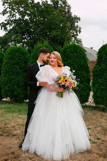 full-shot-married-couple-posing.jpg