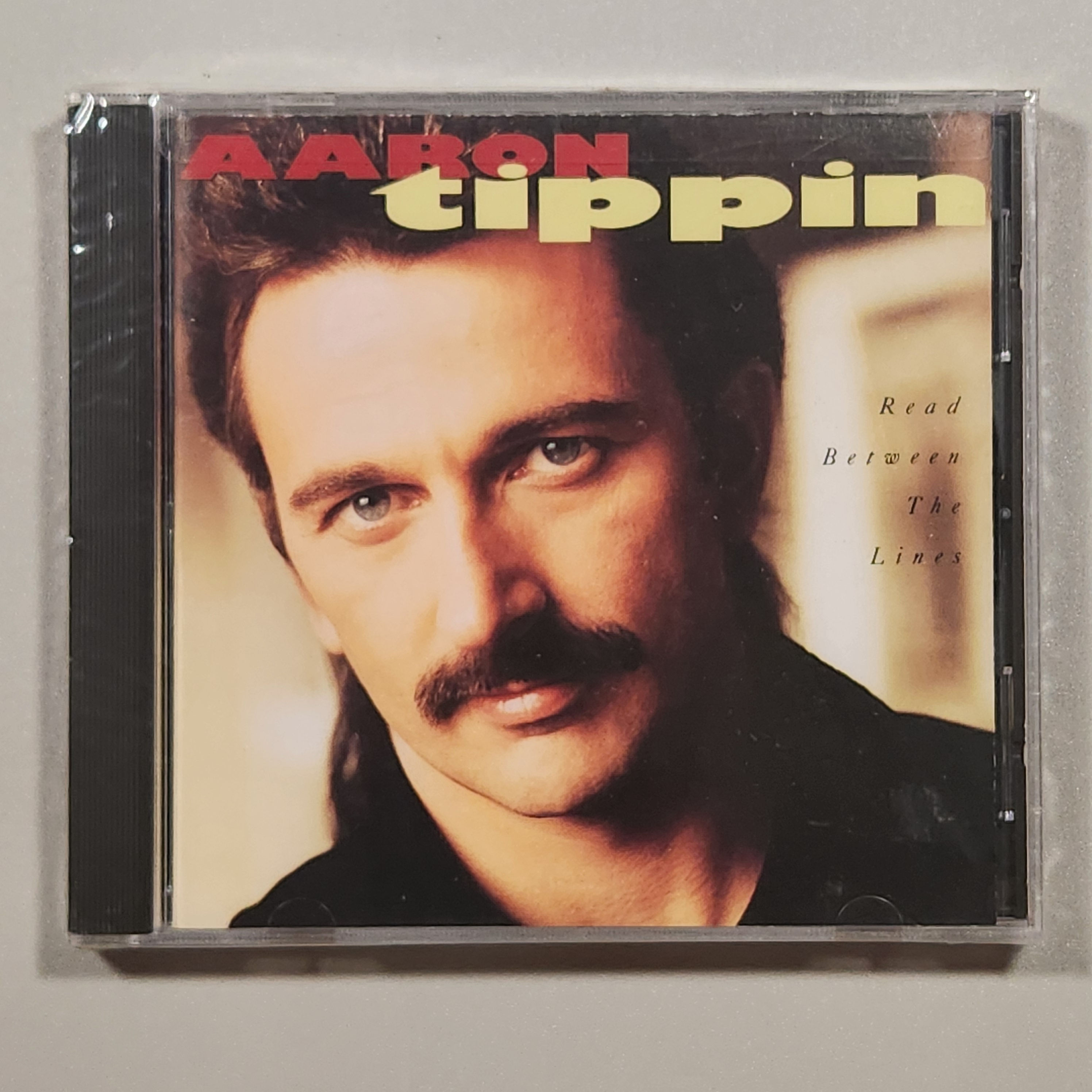 Aaron Tippin - READ BETWEEN THE LINES