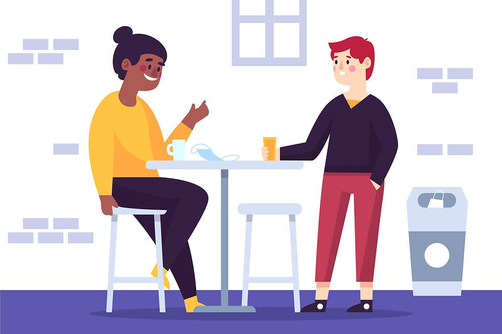 Two people chatting at a cafe table, one seated, one standing with a drink. Bright colors, indoor setting, relaxed mood.