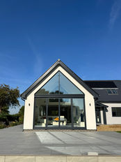 Self-build external patio with bifolds