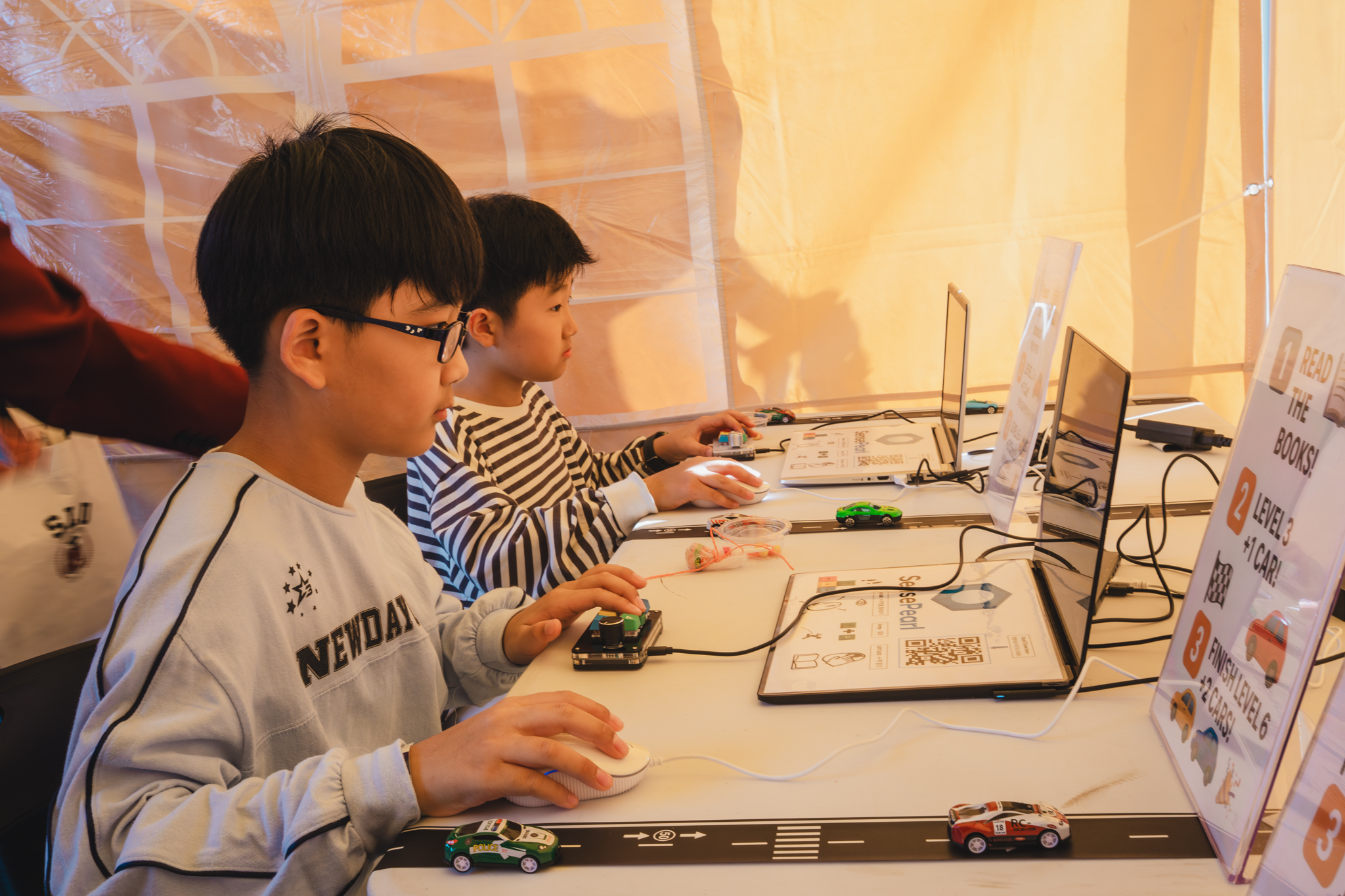 Students using interactive learning tools in classroom