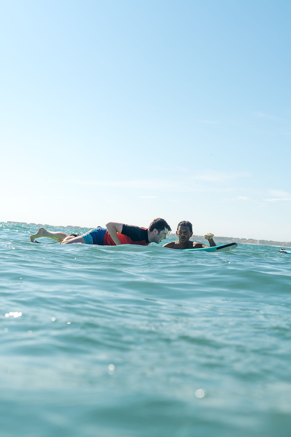 Wide angle view of Sayulita's stunning beach with surfers