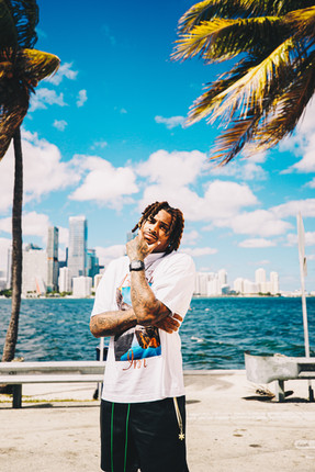 Cornerback for the Miami Dolphins, Jalen Ramsey, posing in front of the Miami, Florida skyline