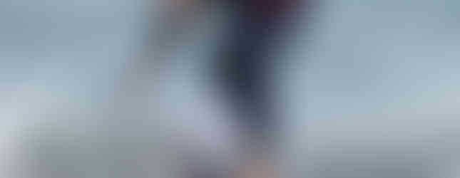 sup racer on a wave showing lots of skill