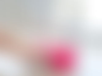 A person cleaning up water coming from a leaking radiator valve