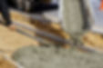 concrete-being-poured-from-truck-into-concrete-with-sidewalk.jpg