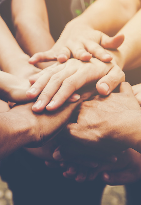 Hands in supporting each other's commitments