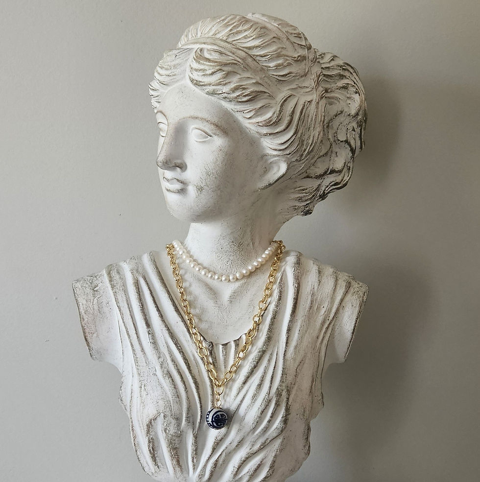Thumbnail: gold necklace with blue bead