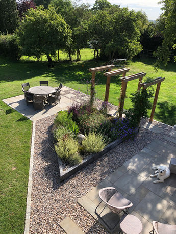 Patio, raised bed and pergola