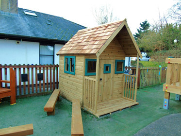 Play house with red cedar shingle roof