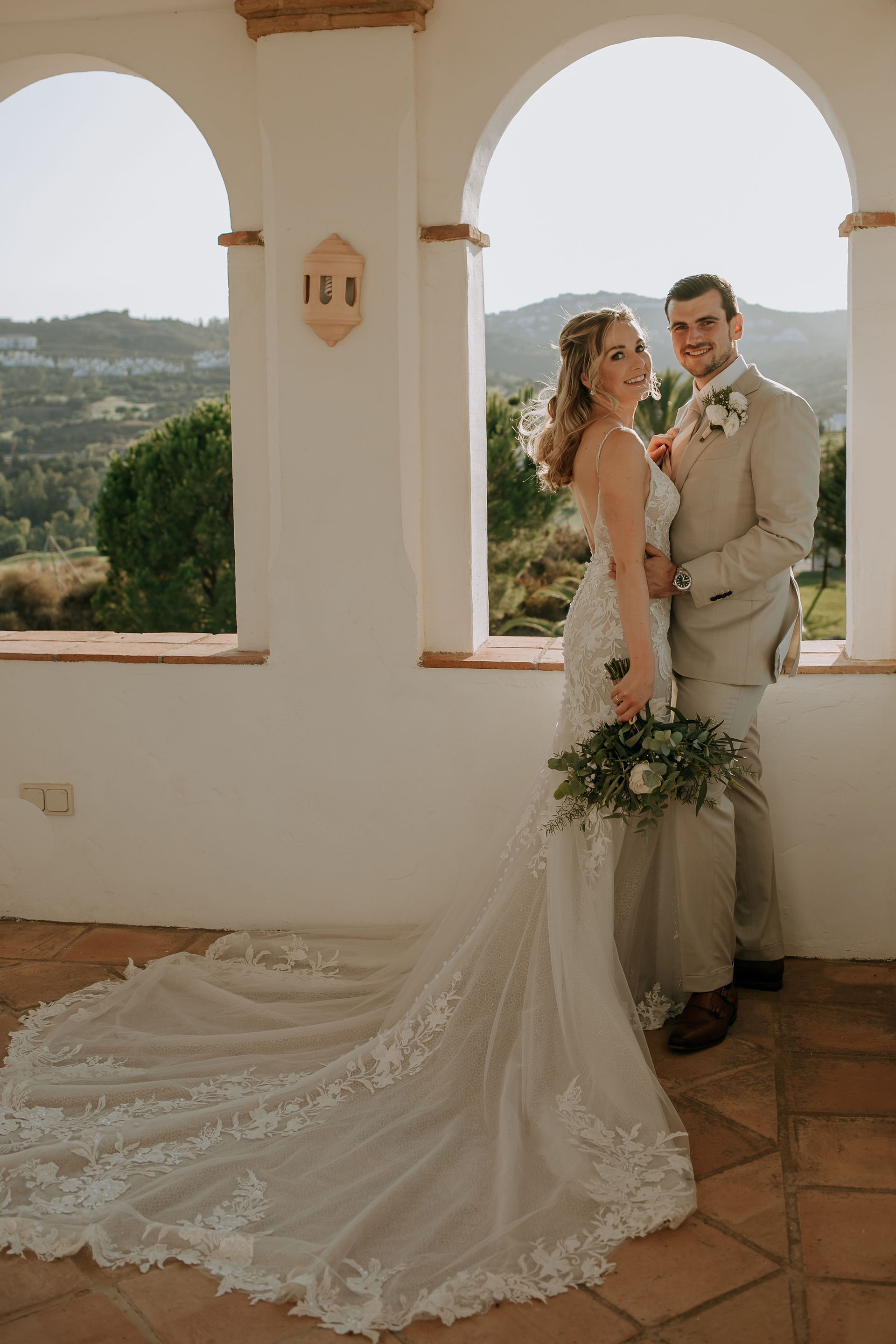 Bride and groom inside a Spanish wedding venue on the Costa del Sol, photographed with soft natural light
