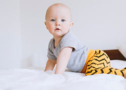 baby on bed