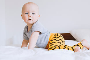 baby on bed