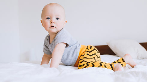 baby on bed