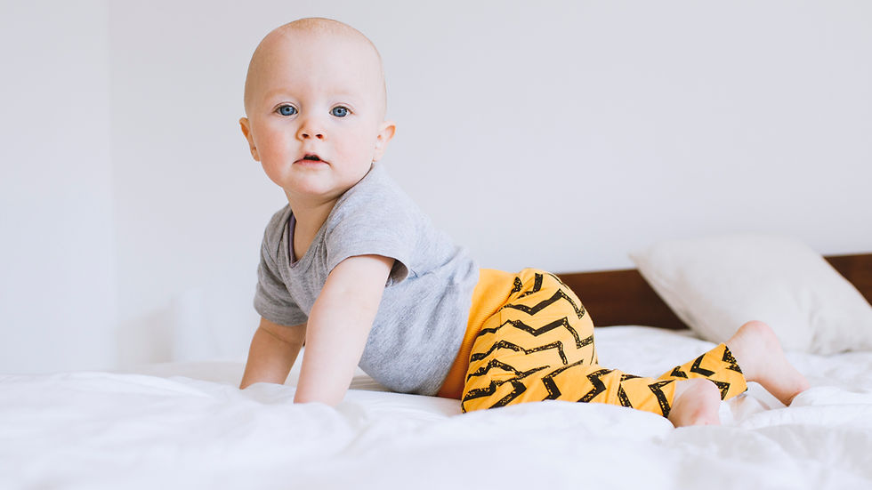 baby on bed