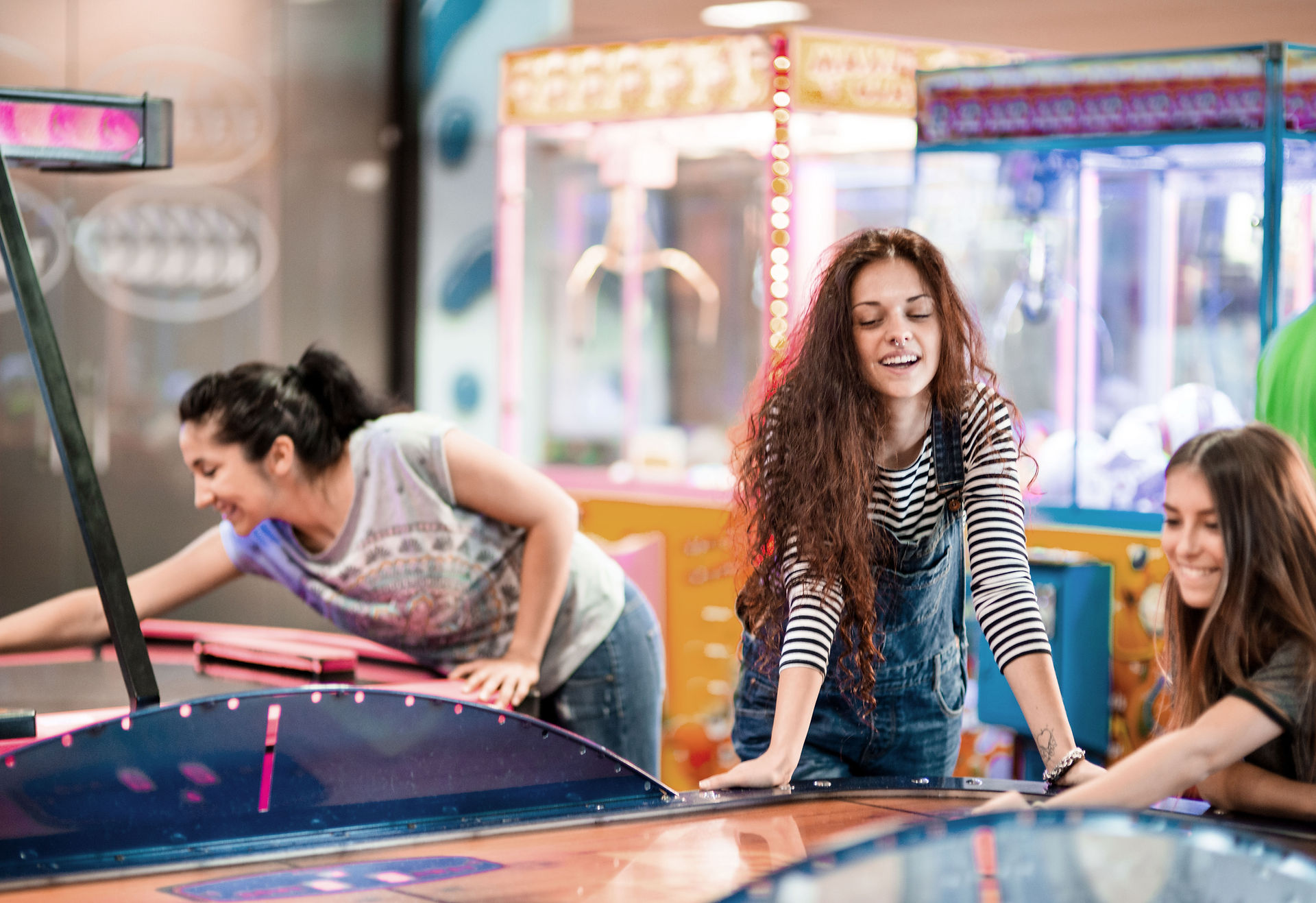 Girls Playing at Arcade
