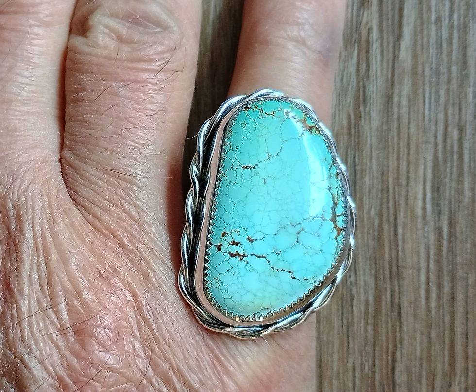 Thumbnail: Handcrafted 32x20mm turquoise statement ring on hand.