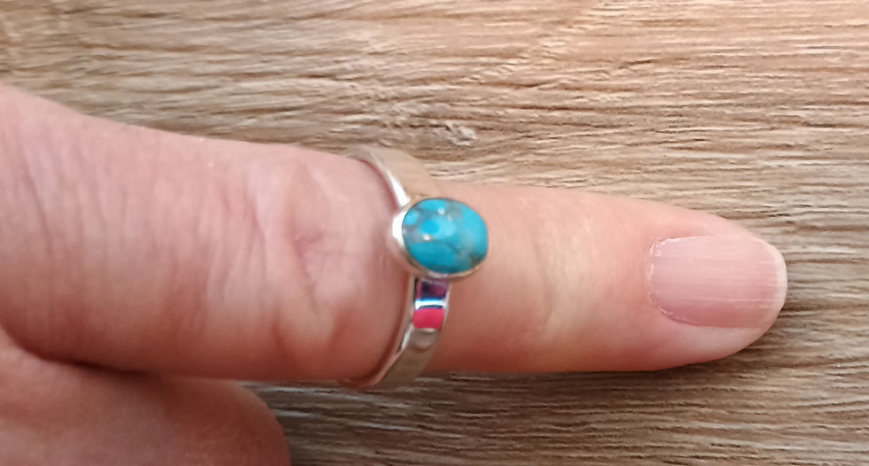 Thumbnail: Petite Kingman turquoise ring worn on finger, bright robin’s egg blue oval cabochon, single band sterling silver, signed LAS,