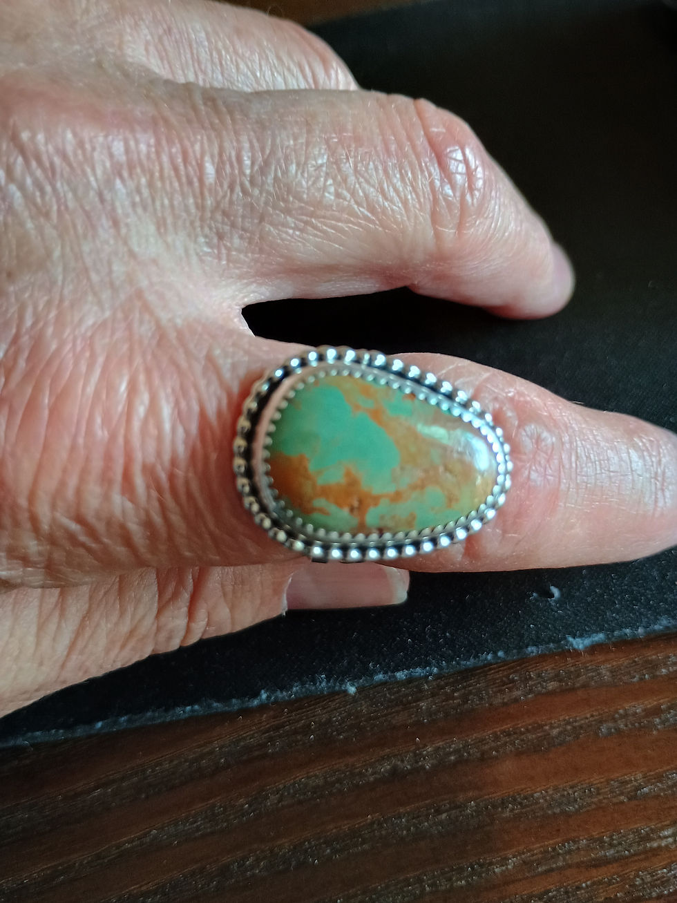 Thumbnail: Royston turquoise ring on finger, 23x16 mm matrix cabochon, beaded bezel sterling, signed LAS, size 10