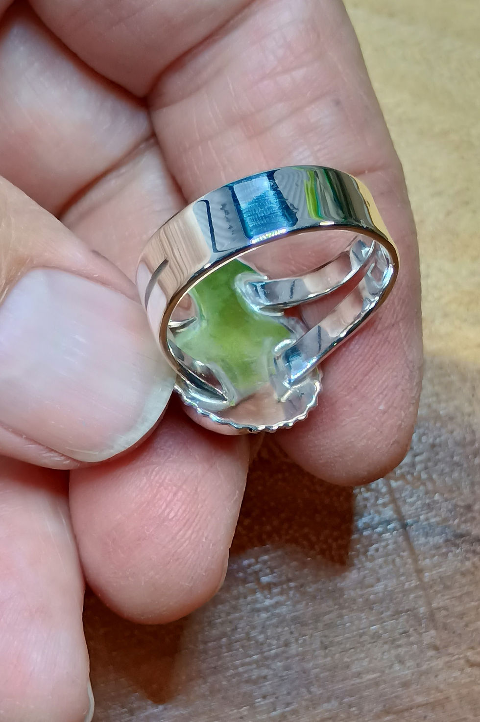 Underside view of sterling silver split-shank ring setting.