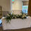 Thumbnail: Top table floral arrangement