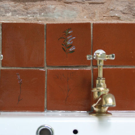 Splash back in bathroom with tiles in situ. 