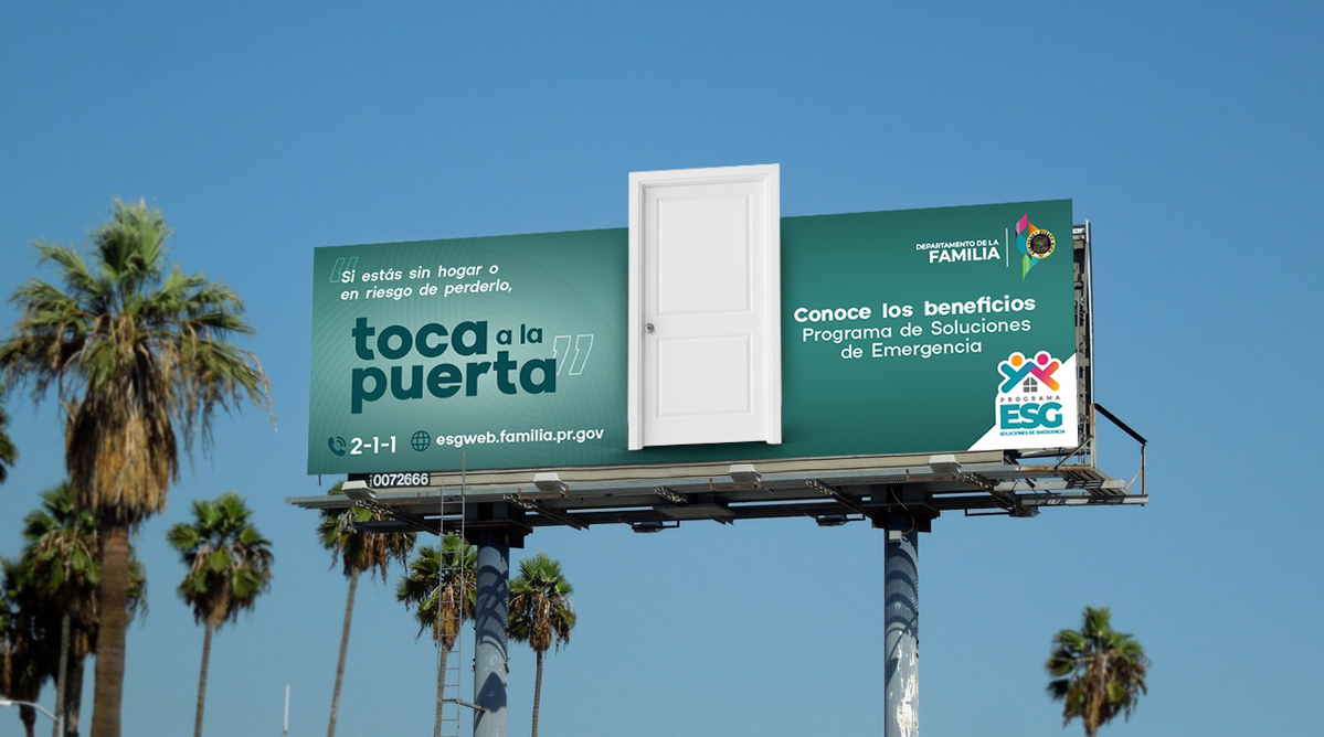 Toca a la puerta outdoor billboard featuring a three-dimensional white door