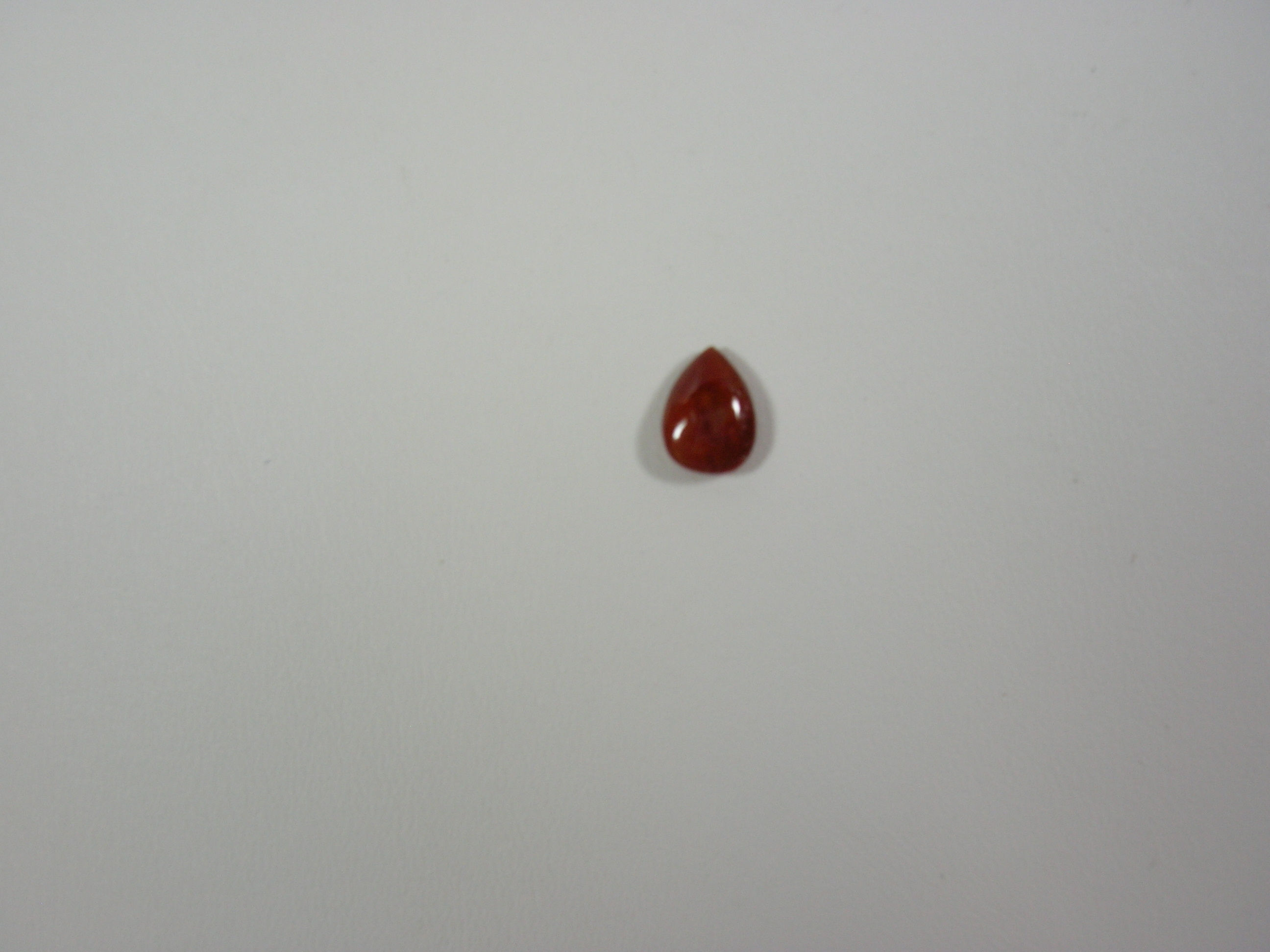 LOOSE RED JADE PEAR STONE. " SALES" " DIS"