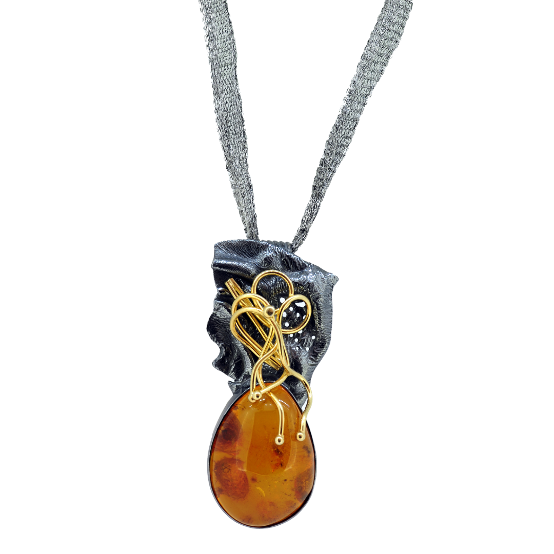 Statement Amber and titanium pendant