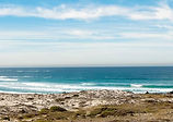 a-serene-beach-landscape-with-gentle-waves-lapping-at-the-shore-asilomar-hotel-and-confere