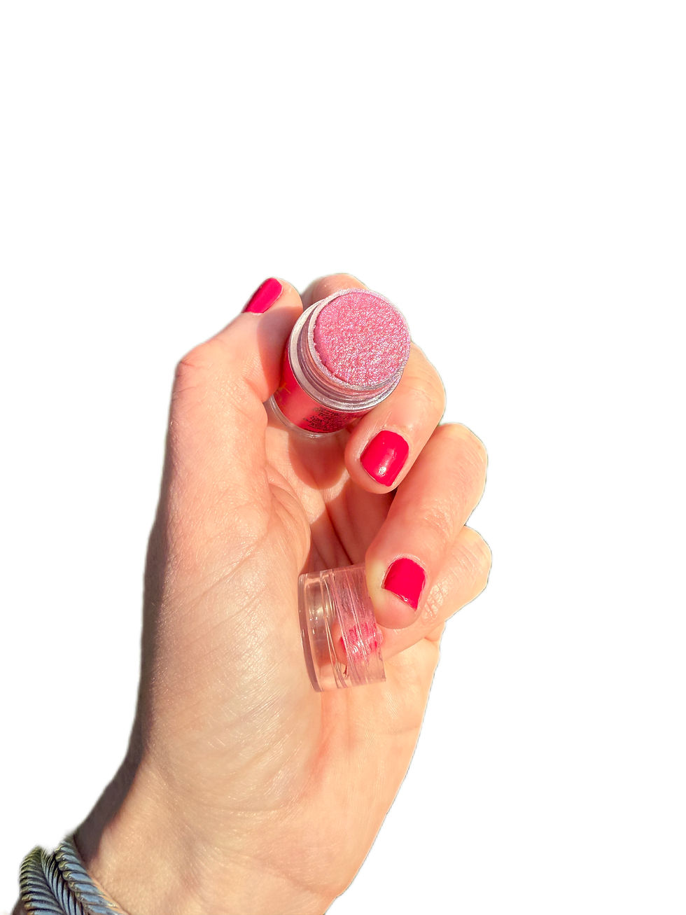 High angle view of Bitty Balm collection on a vanity table