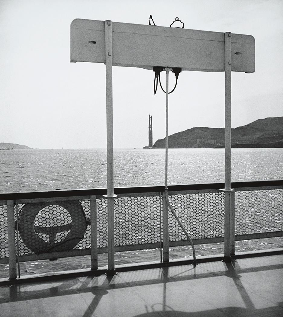"Looking from Ferry Boat at Golden Gate with on Bridge Tower Completed...1934"