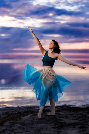Dancer on Sand in Front of Lake near Great Salt Lake in Utah