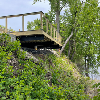 New deck cantilevered out above a slope.