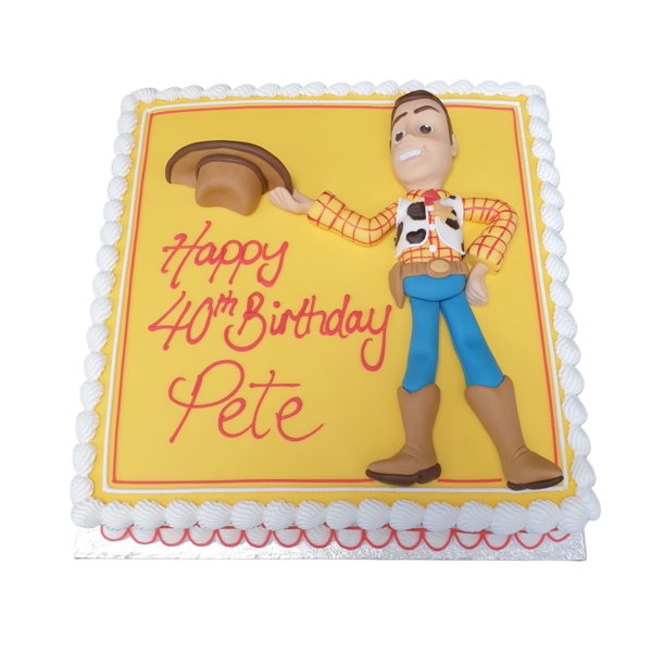 A whimsical Toy Story-themed cake featuring a cheerful design inspired by Woody the cowboy, perfect for kids' birthday parties and Disney fans.