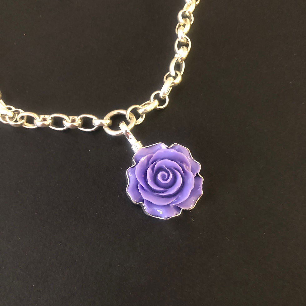 a 1.25 inch necklace charm of a dark lavender rose by Coreen Cordova