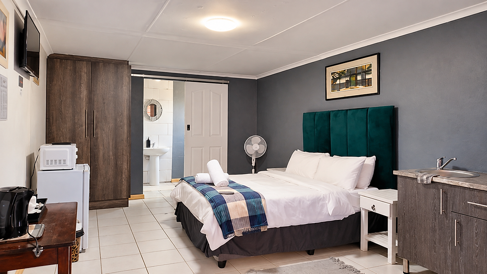 Warmly refined guest house room.png