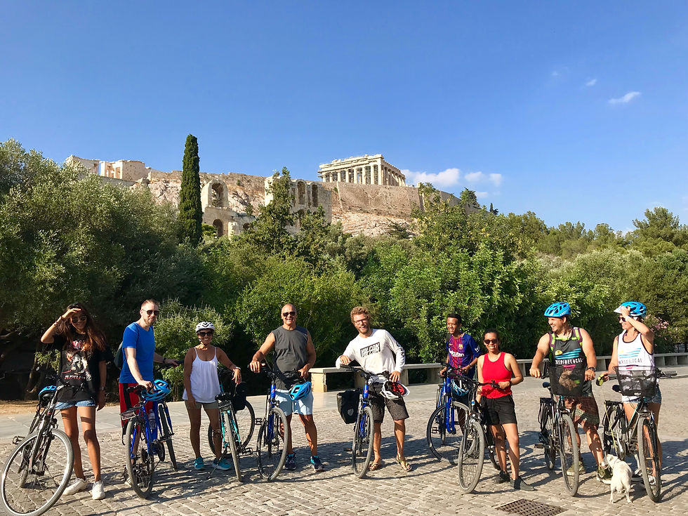 Cyclists under Acropolis tour