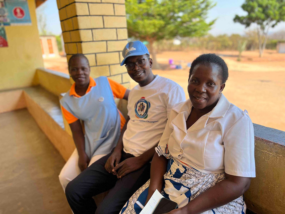 The original health-care team at Simonga Health Post (left to right): Miriam, Samuel and Melody