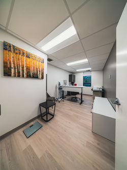 Modern medical examination room with scale