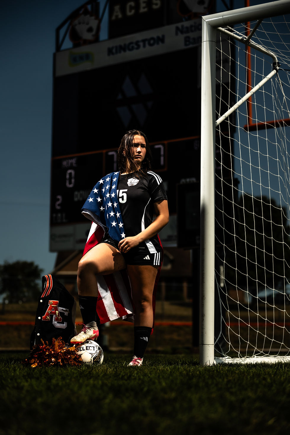 female-soccer-player-american-flag-sports-portrait.jpg