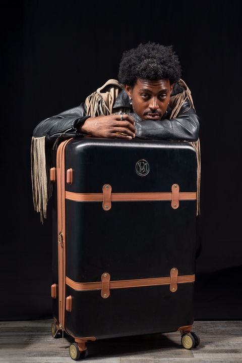 Cinematic portrait of a professional in Rahway, NJ captured with dramatic studio lighting and authentic expression, photographed by Ramon Trotman Studio.”