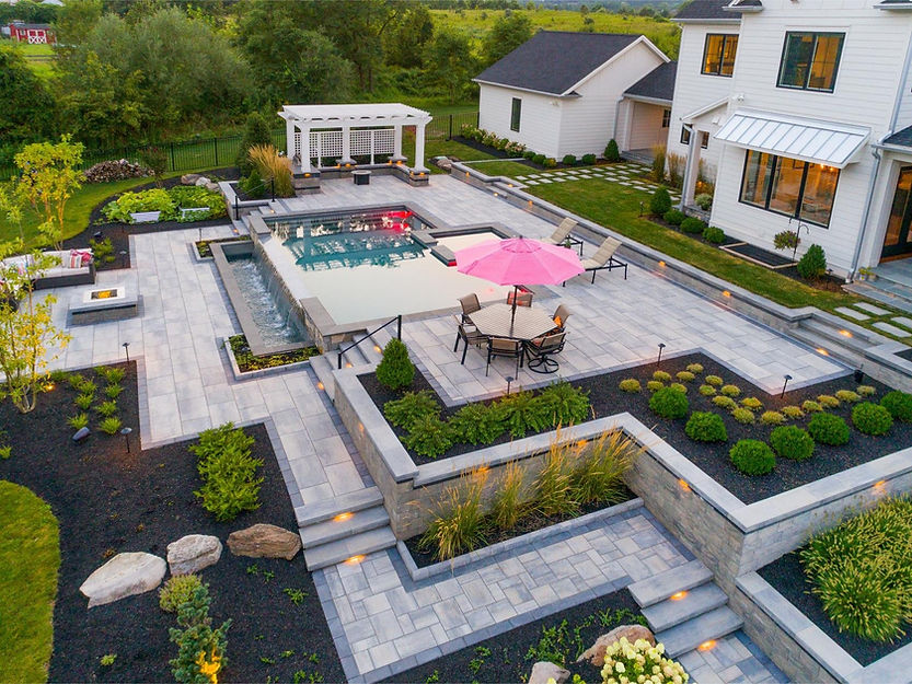 backyard with lots of paver walkways.jpg