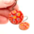 Ceramic Terracotta Red wire earrings in hand