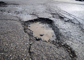 Parking Lot Pothole Repair: What Causes It and How Fast It Should Be Fixed