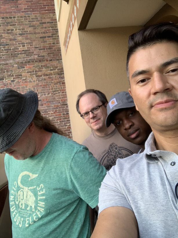 The intrepid travelers outside the hotel